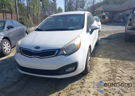2012 Kia Rio Ex z USA, uszkodzony, nr VIN KNADN4A32C6090186